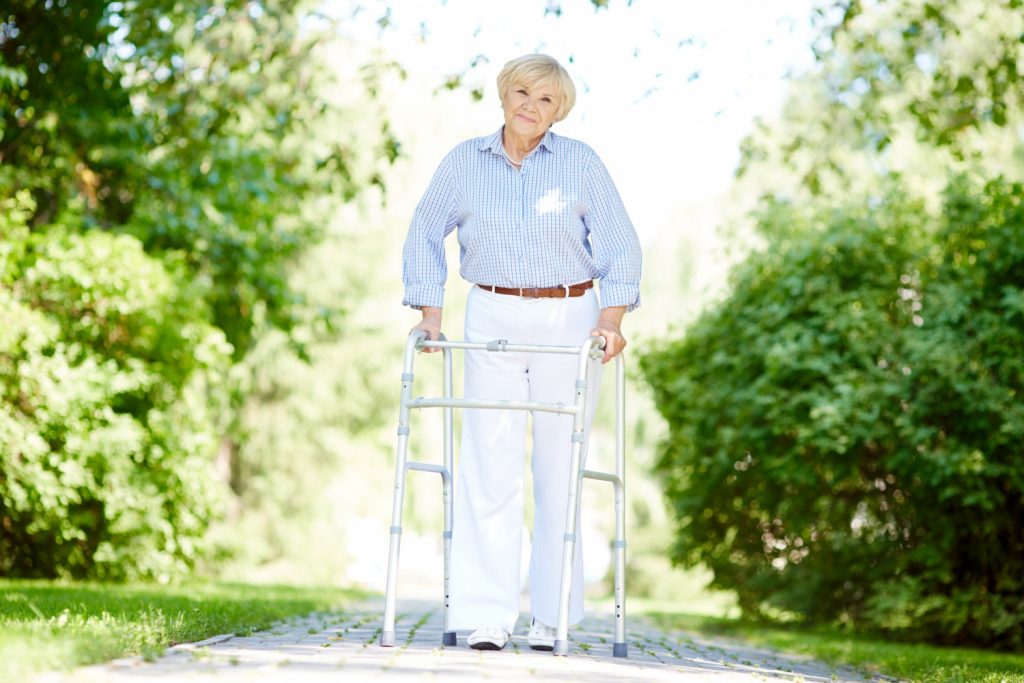 a woman with a walker